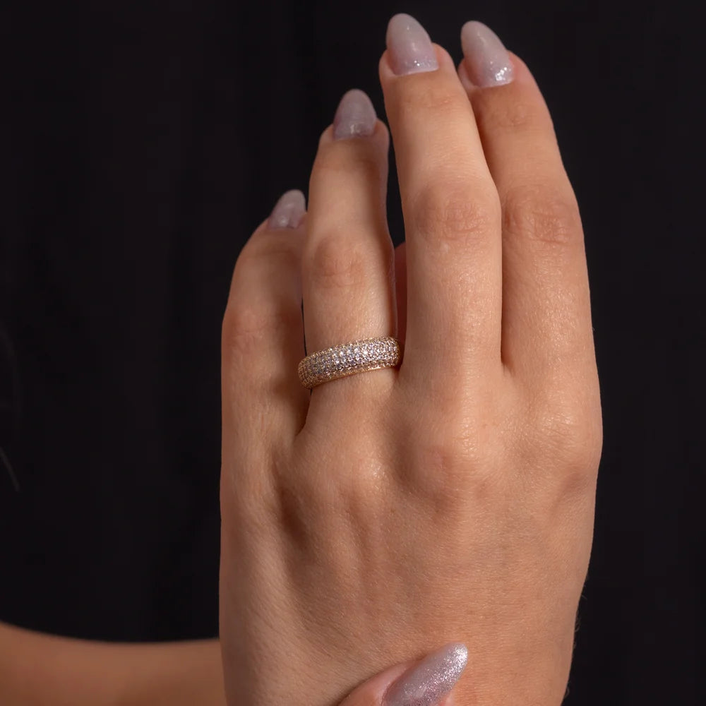 Elegant 18k Gold Plated Band Ring with Crystal Zirconia on a hand, showcasing its sparkle and design