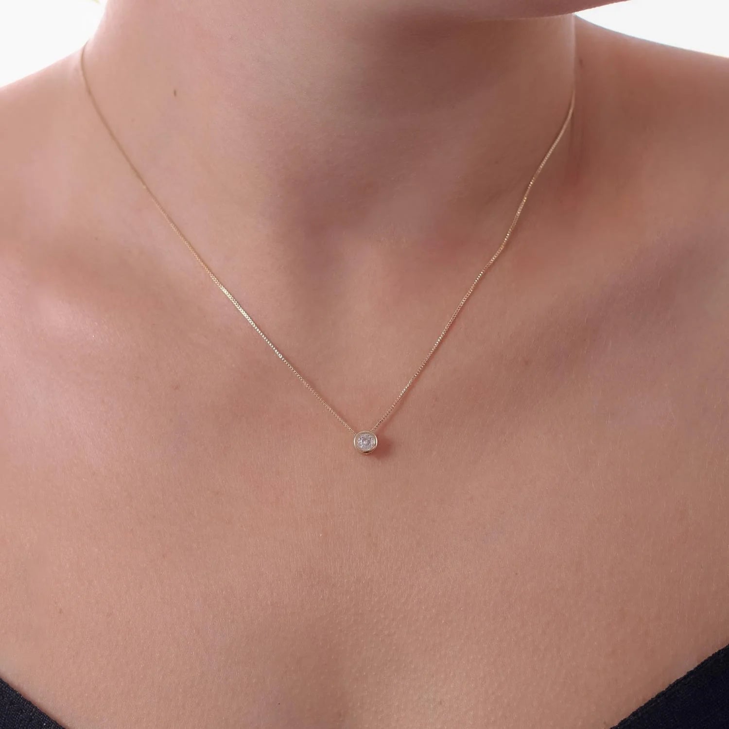 18k Gold Plated Crystal Studded Pendant Ireland Online on a delicate chain worn by a model