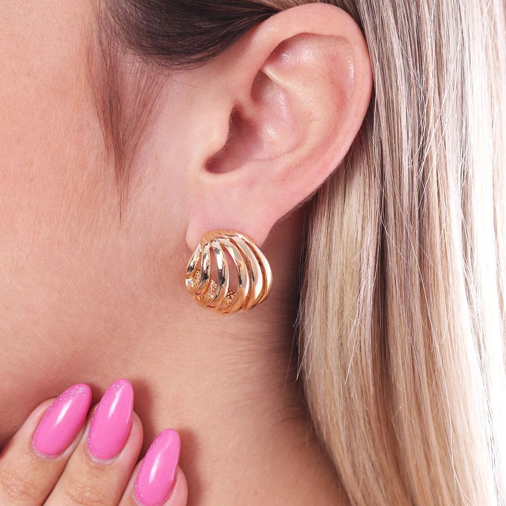 Stylish 18k Gold Plated Damped Hoop Earrings Ireland Online shown on a model's ear