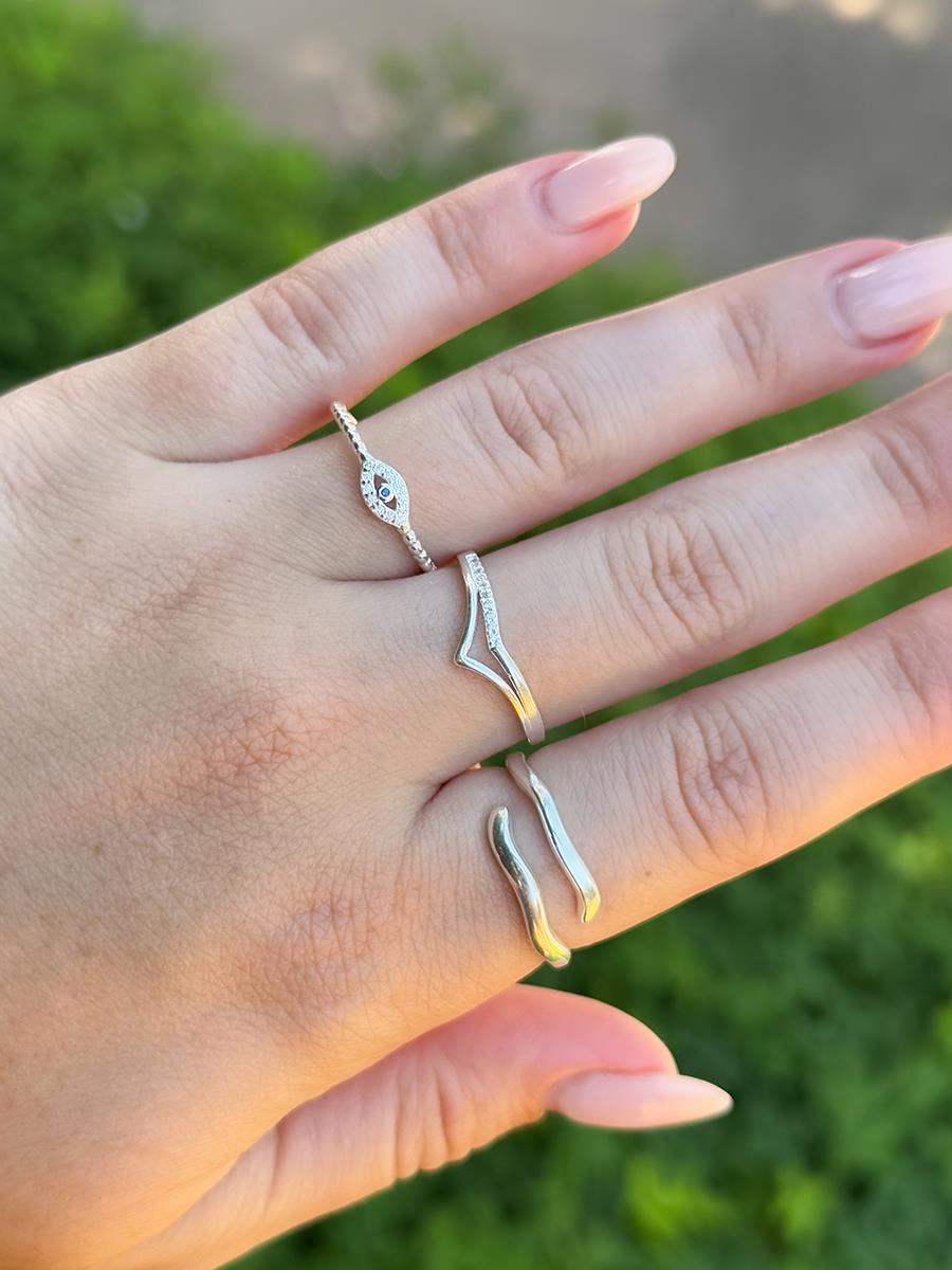 Tamis Jewellery 925k Silver Minimalist Ring Ireland Online displayed on a hand with three rings