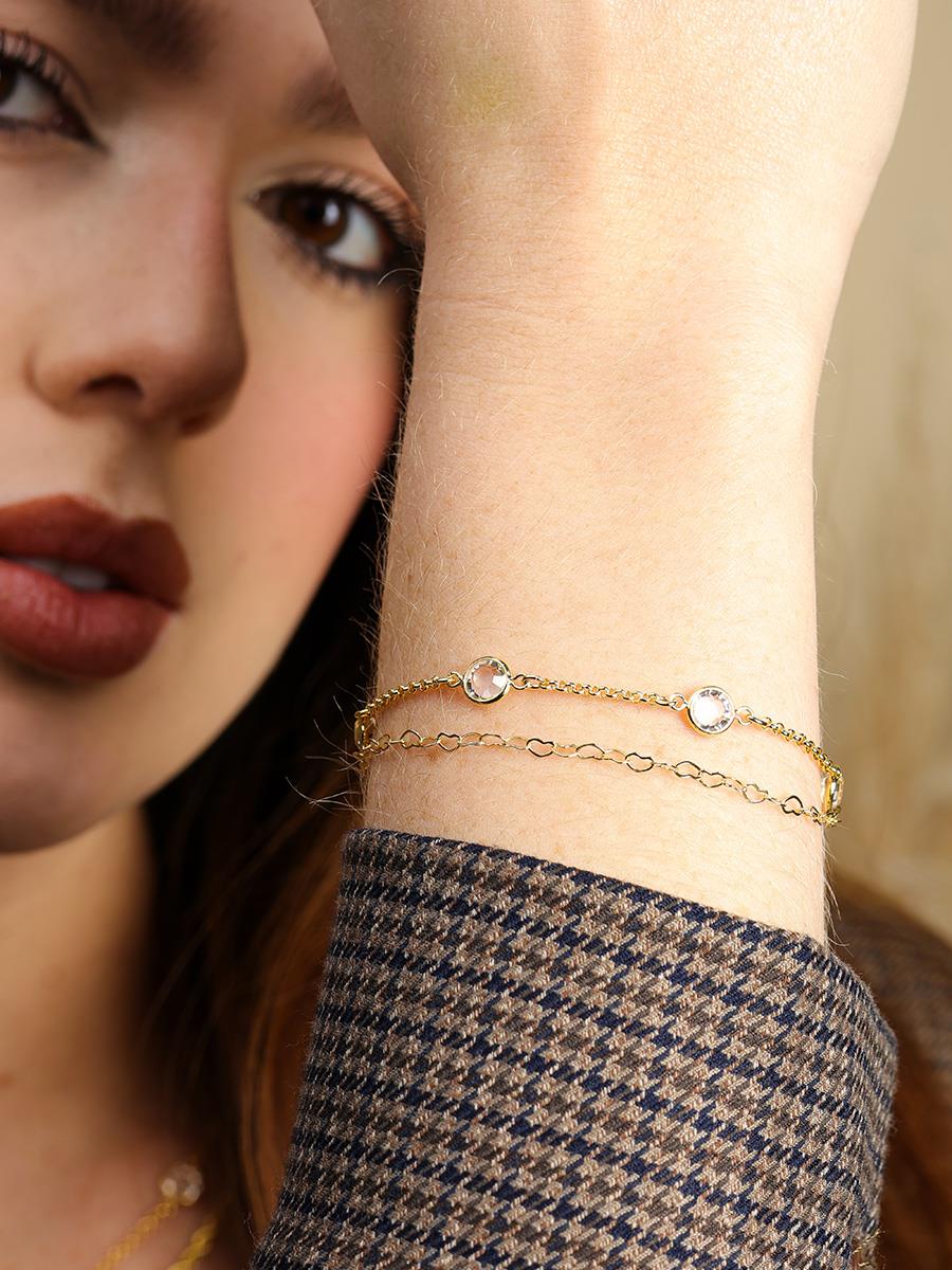 Gold heart bracelet styled with casual outfit - Dublin fashion