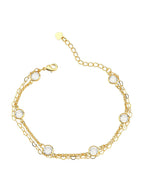 Close-up of gold heart charm and zirconia details - Brazilian jewelry